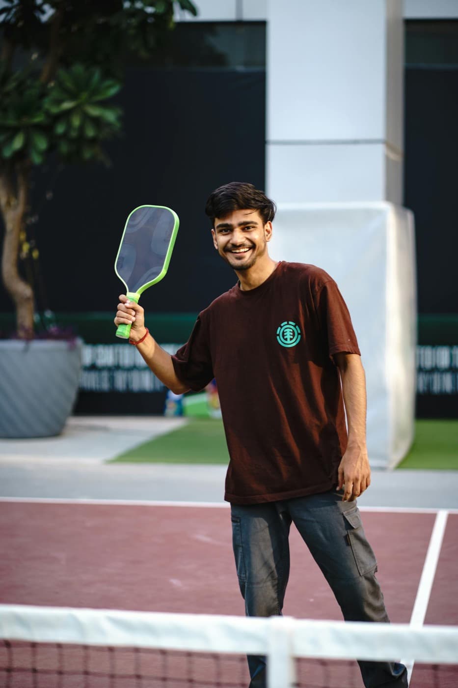 Pickleball player on an outdoor court