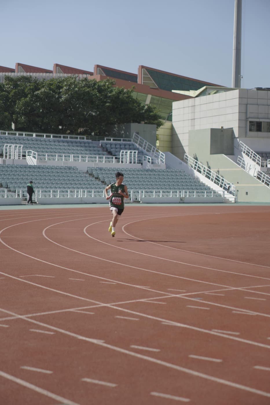 Runner sprinting on a track