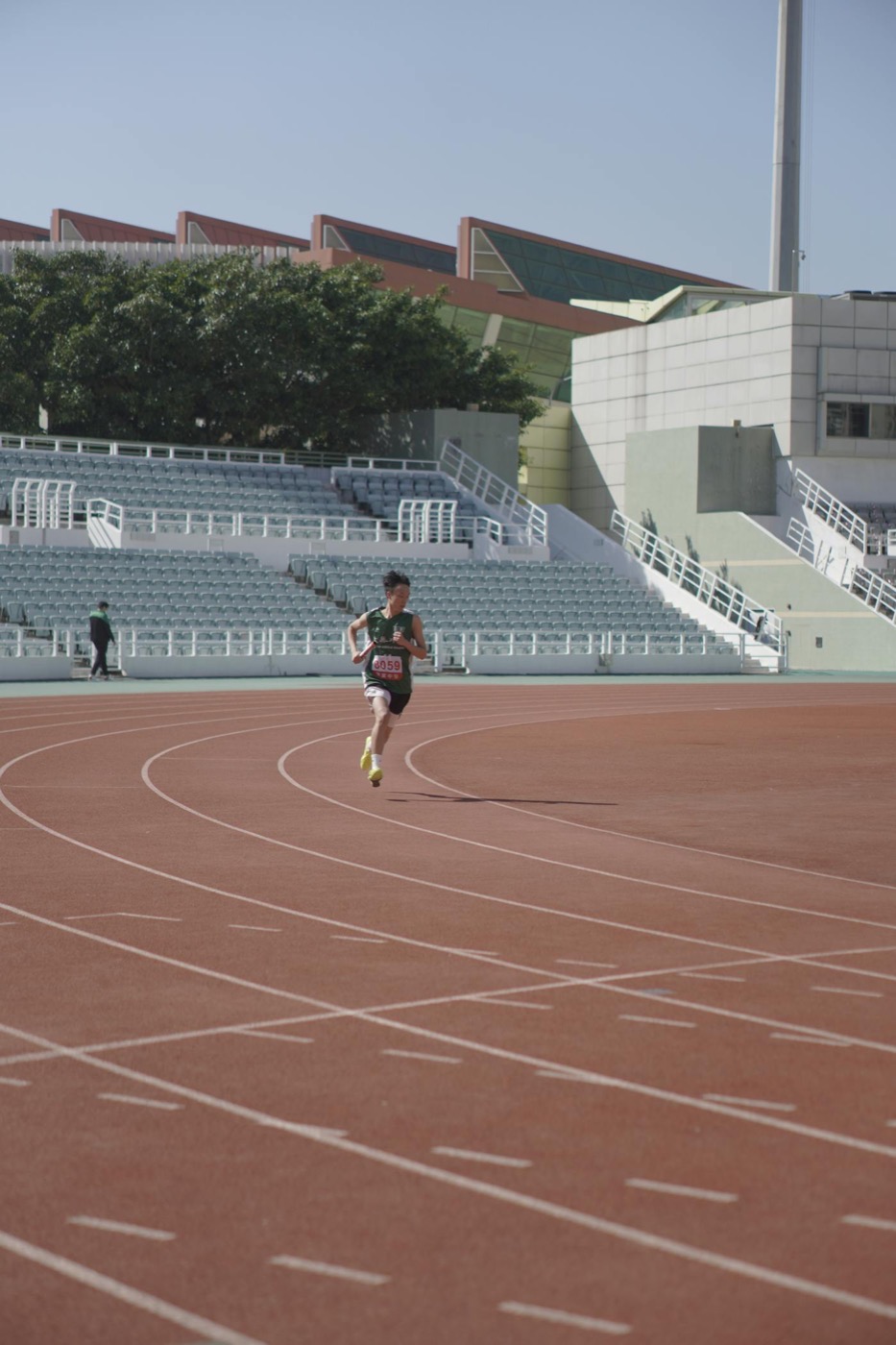 Runner sprinting on a track during structured training